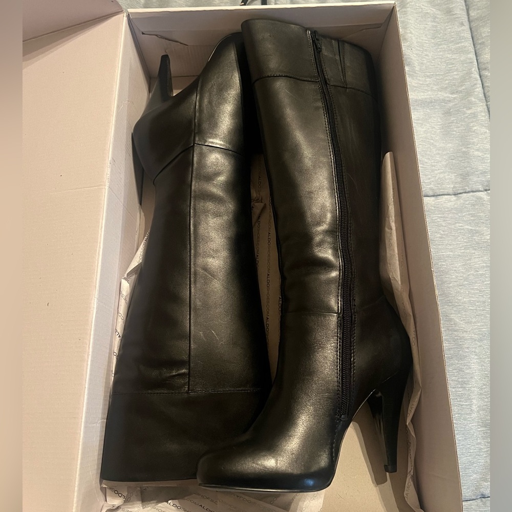Brand new Aldo boots. Never worn in box. size 7.5
